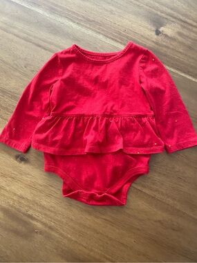 Red sparkly skirted onesie